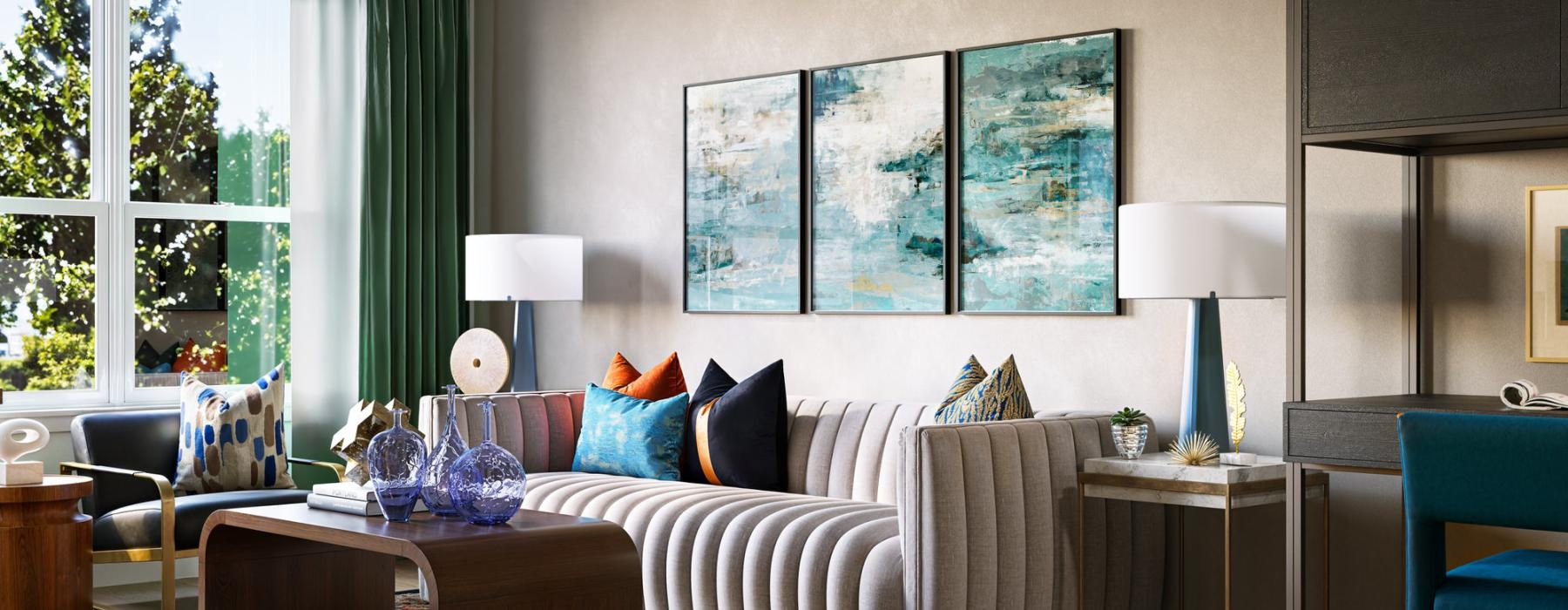 a living room with a couch and chairs