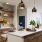 a kitchen with a marble island