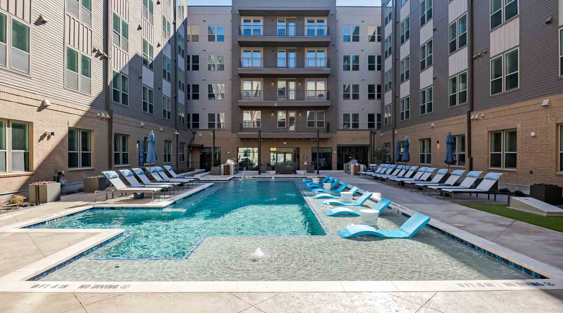 Pool with lounge chairs 