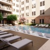 swimming pool with chairs around it