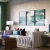 a living room with a couch and chairs